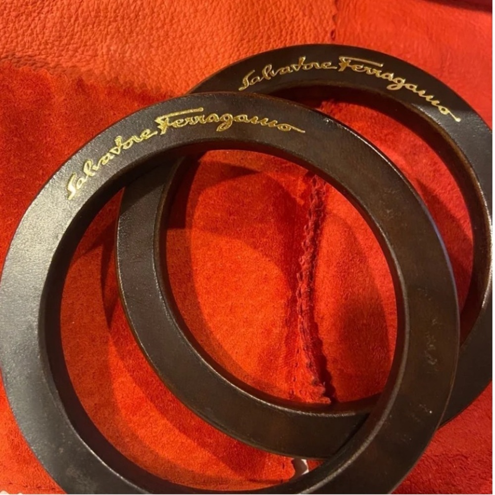Salvatore Ferragamo Vintage Wooden Bangle Bracelets in a suede pouch.